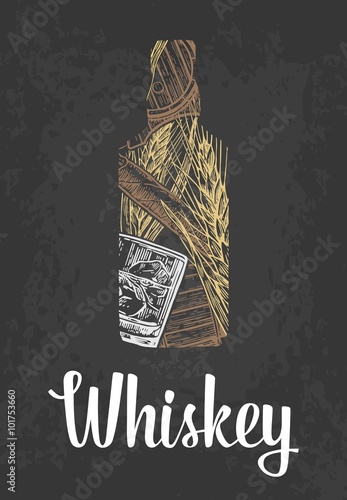 butelka-whisky-ulozona-z-szklanki-i-klosow-na-ciemnym-tle
