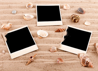 background of the three cards on the sand with shells