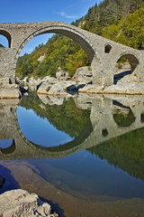 Amazing Reflection of Devil's Bridge in Arda river, Kardzhali Region, Bulgaria