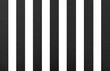 Striped background of black paper