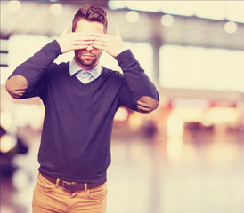 Wall Mural - cool man covering his eyes