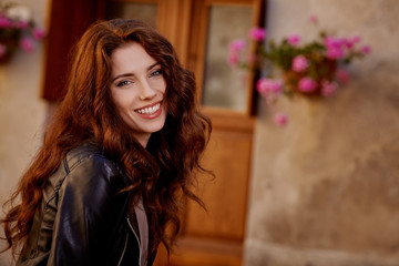 Poster - Fashionably jacket woman on the streets of a  Italian town