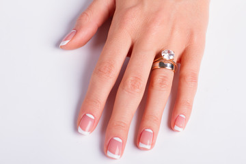 Fotomurales - Diamond ring and wedding ring on woman's finger.
