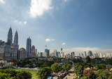 Fototapeta Miasto - KUALA LUMPUR, MALAYSIA - 11TH JANUARY 2016; View of downtown Kuala Lumpur, Malaysia (called simply KL by locals). KL is a busy city with skyscrapers,colonial architecture and lots of greenery.