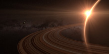Planet Saturn With Rings At Sunrise On The Space Background 
