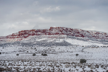 Red mountain with snow haze at sunset, USA