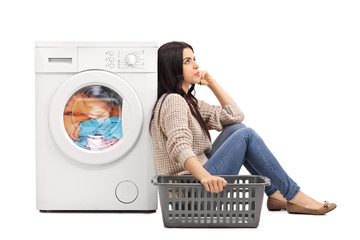 Bored woman waiting for the laundry