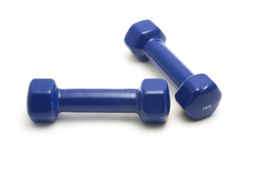 Two dumbbells on a white background