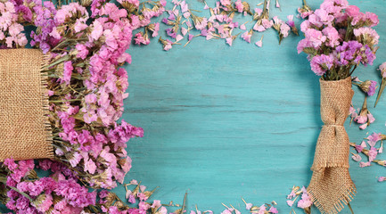 Wall Mural - Beautiful flowers on green wood.