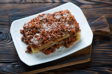 Wall Mural - High angle view of lasagna bolognese, studio shot, closeup