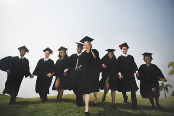 Canvas Print - Group Students Holding Hands Graduation Concept