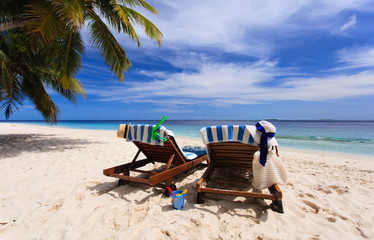 Wall Mural - Two chairs on tropical beach vacation