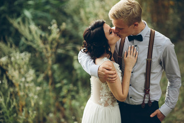 bride and groom kissing