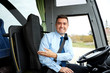 © Syda Productions - happy driver inviting on board of intercity bus