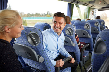 Wall Mural - group of happy passengers in travel bus