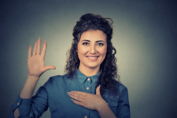 Young woman making a promise