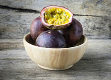Passion Fruit On Wooden Bowl