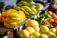 A Box Of Starfruits On A Market Stall Background