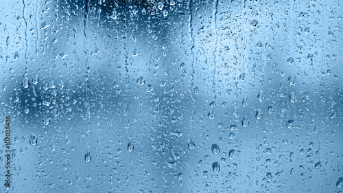 Plakat na zamówienie Raindrops on the window. Blue tone
