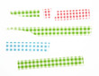Collection of different stripes of masking tapes on white background for scrapbook