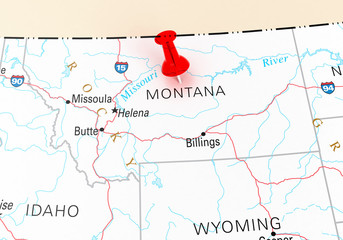 Red Thumbtack Over Montana State USA Map