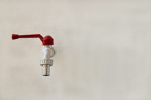 Faucet Valve On Wall Background