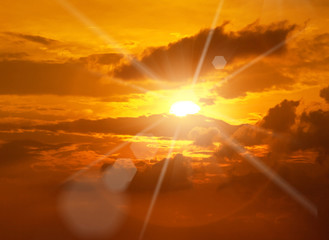 beautiful peaceful sunset - bright sun, yellow beams
