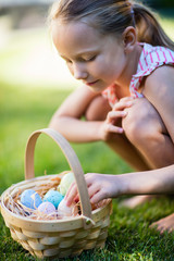 Wall Mural - Little girl with Easter eggs