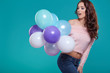 © ZoomTeam - Young pretty woman with colored balloons