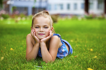 Poster - Little happy girl in summer park