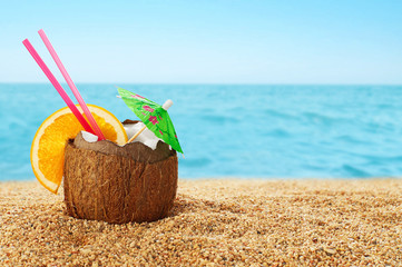 Coconut cocktail at the beach.