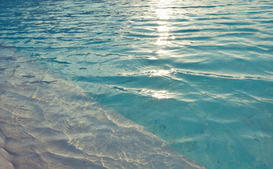 Blue swimming pool rippled water detail