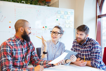 Wall Mural - Happy business people working together