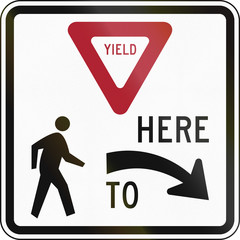 Wall Mural - United States MUTCD regulatory road sign - Yield here to pedestrians