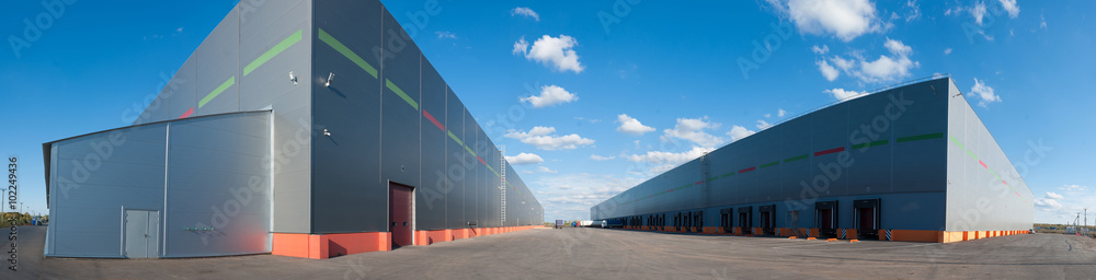 Panorama of big industrial warehouse buildings - obrazy, fototapety, plakaty 