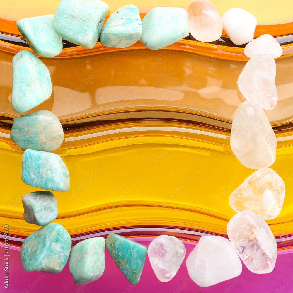 Semiprecious stones on bright background