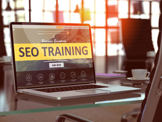Wall Mural - seo - search engine optimization - training concept. closeup landing page on laptop screen on backgr