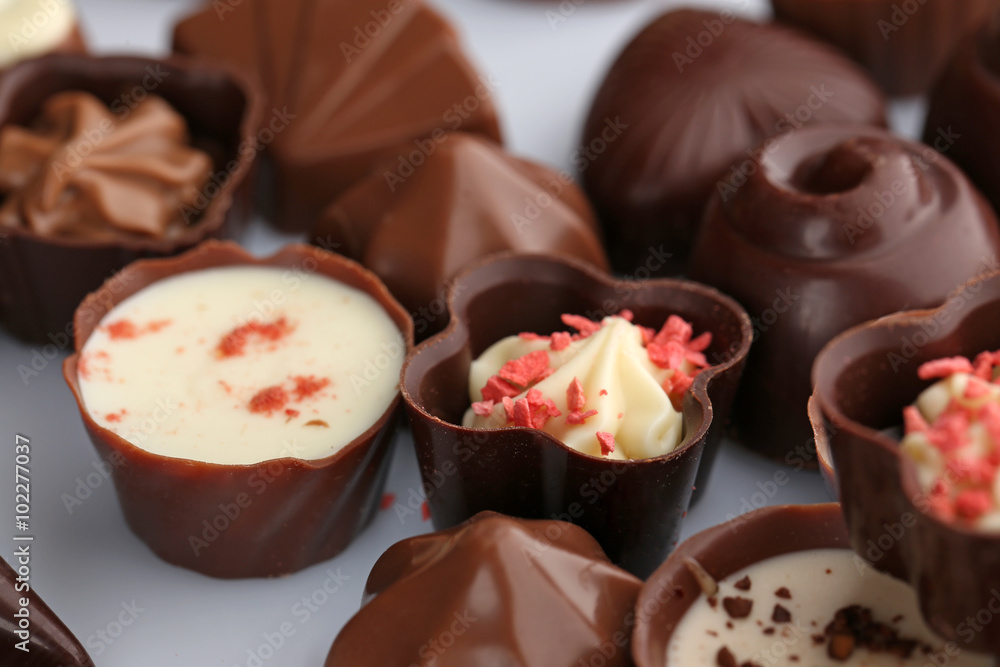 Assorted chocolate candies, close up