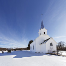 Old White Country Church In Winter With Snow