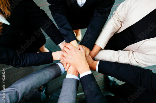 Fotografía Overhead picture of business people joining hands
