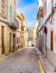 Fototapete - Mediterranean street with rustic old buildings