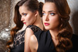 © cherry_d - Portrait of beautiful twins young women in gorgeous evening dresses