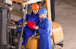 © 1001color - Two businessman working in factory