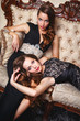© cherry_d - Portrait of beautiful twins young women in gorgeous evening dresses