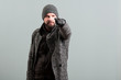 © Catalin Pop - Bearded man looking at camera and pointing finger