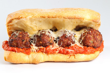 Wall Mural - Tasty meatballs sandwich in a ciabatta with tomato sauce and parmesan