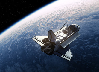 Wall Mural - space shuttle orbiting earth