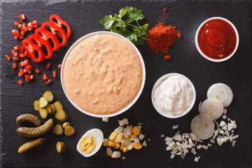 Thousand Island Dressing with ingredients. Horizontal top view
