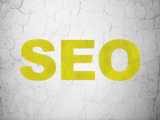 Web development concept: SEO on wall background