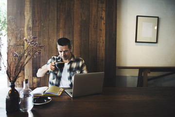 Wall Mural - man relax lifestyle working coffee shop concept